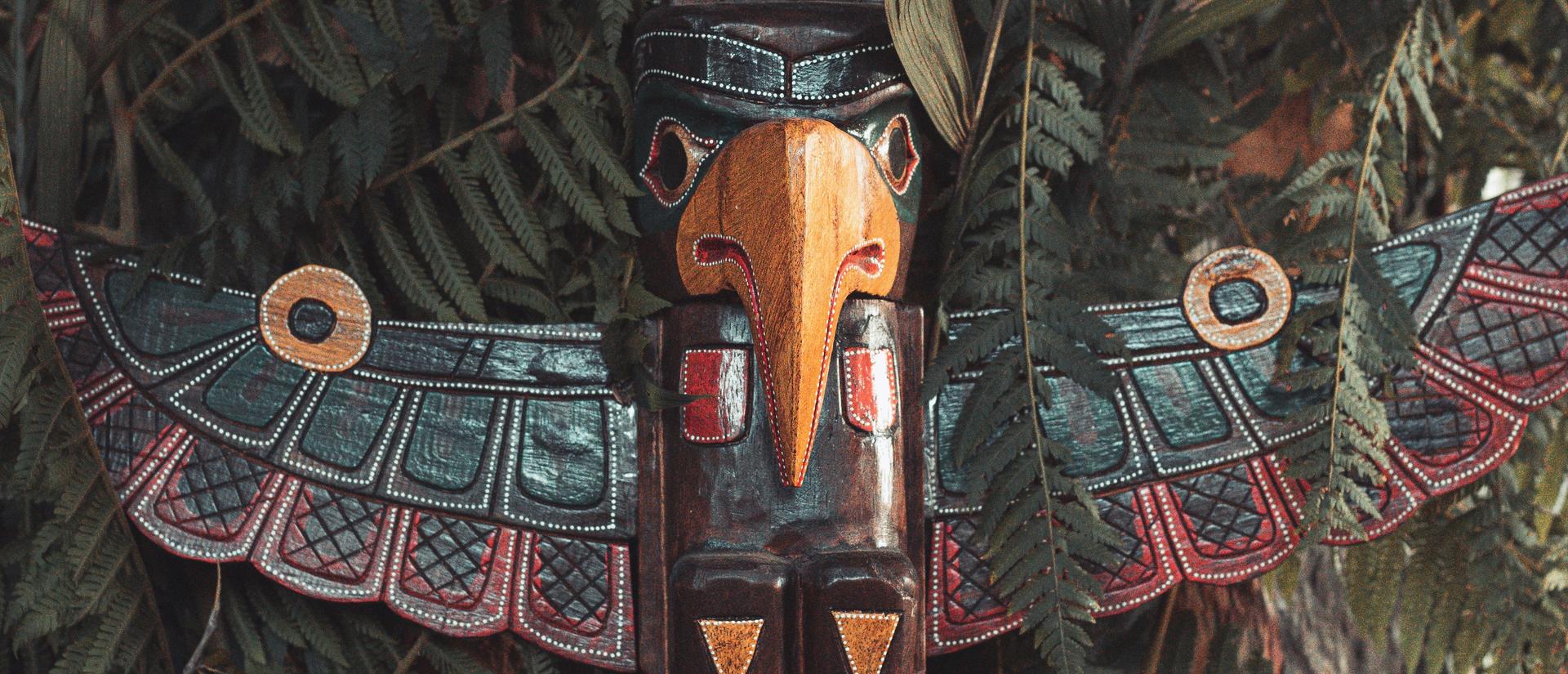 Wooden painted bird sculpture